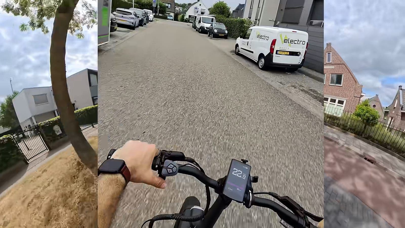 First-person zicht op het stuur en het 3,5-inch kleurendisplay tijdens het fietsen