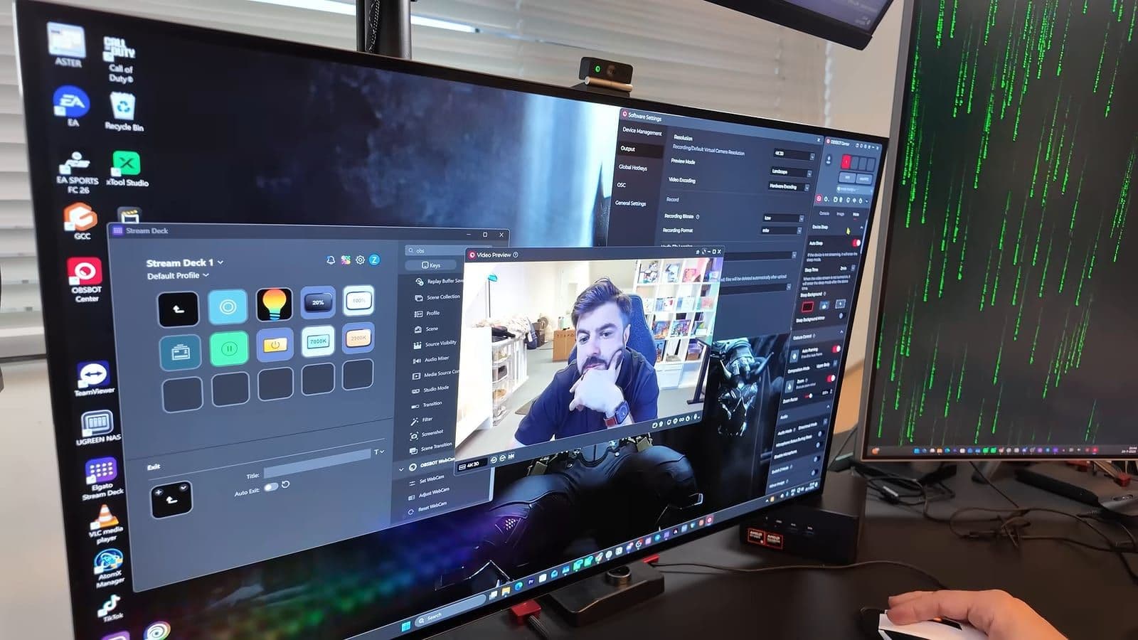 OBSBOT Meet Flip mounted neatly on top of an ultrawide PC monitor